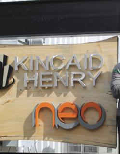 Kincaid Henry standing in front of the NEO Center